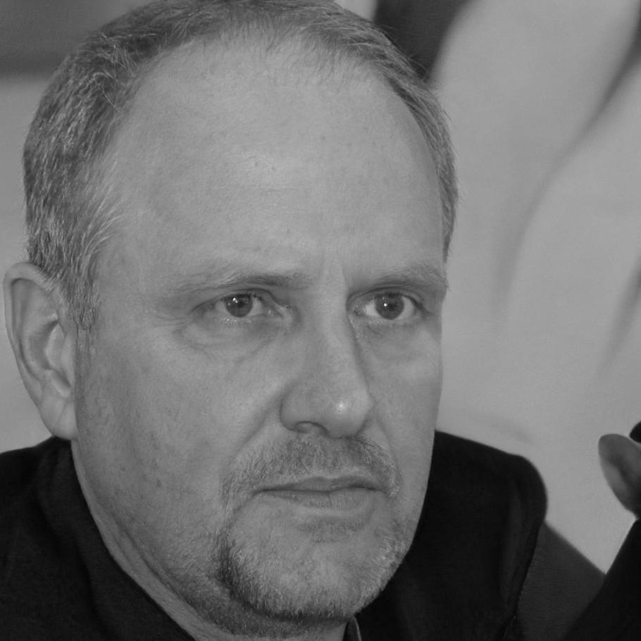 Professional headshot of Carlos Montenegro