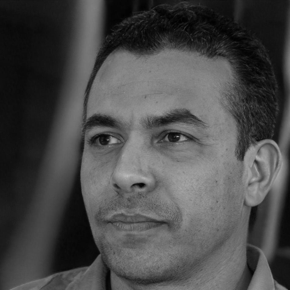 Professional headshot of Eduardo Ramirez