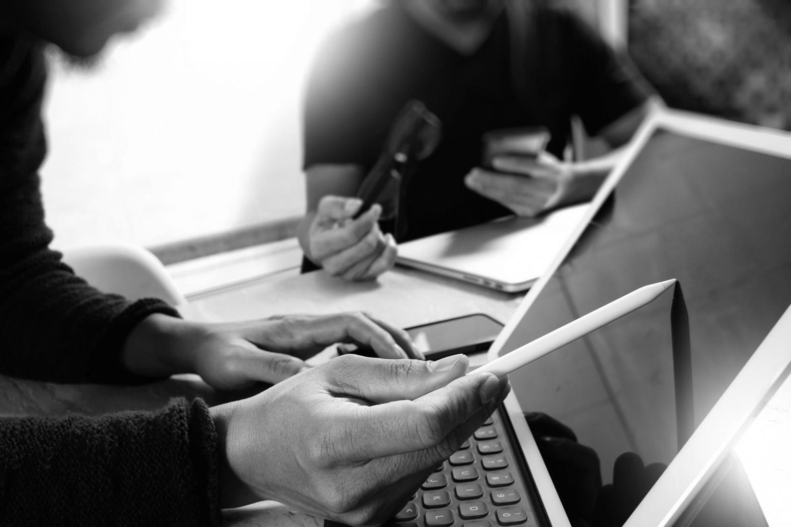 Strategic business meeting discussing blockchain integration solutions